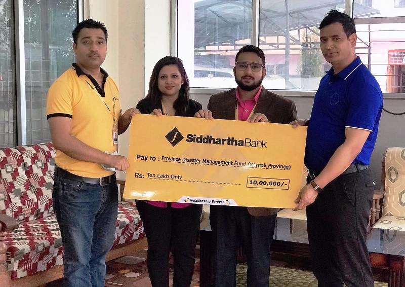 सिद्धार्थ बैंक द्वारा कर्णाली विपद् कोषमा १० लाख सहयोग